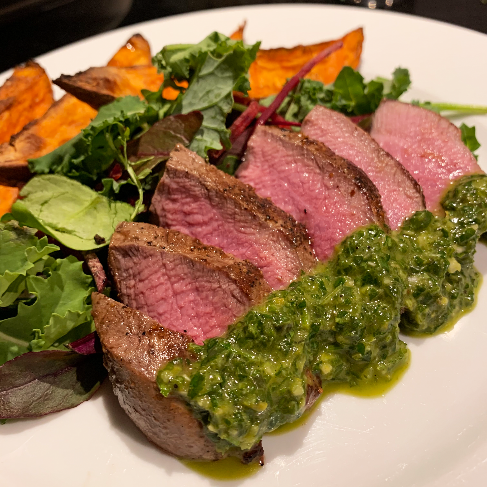 Venison Pave Steak with Green-Herb Sauce